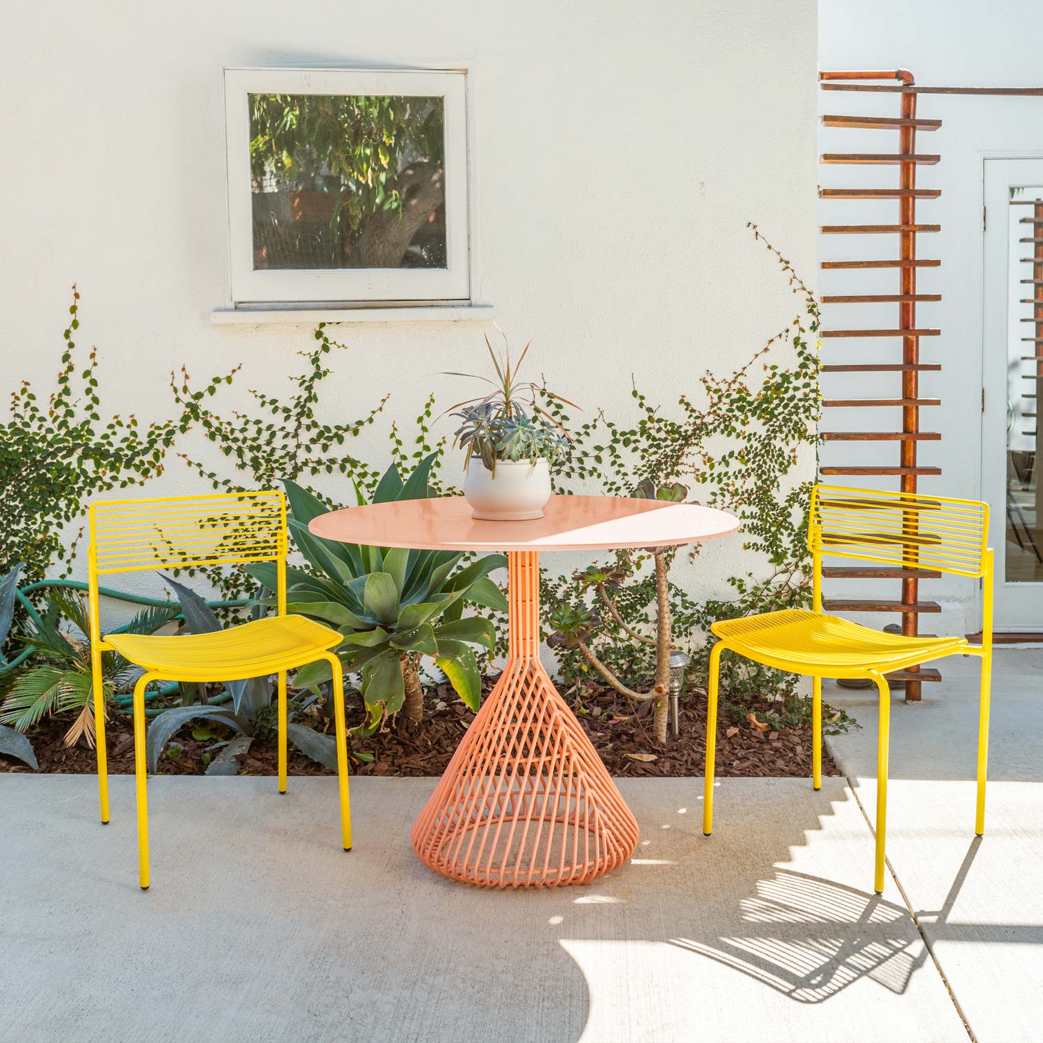 Rachel Chair in yellow  with Bistro Table in peachy pink